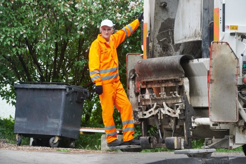 Staff logging a service complaint related to rubbish collection