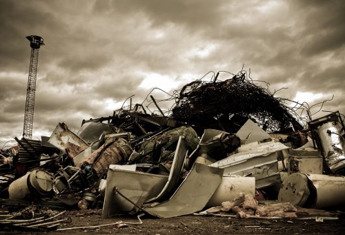 Professional waste clearance team managing construction debris